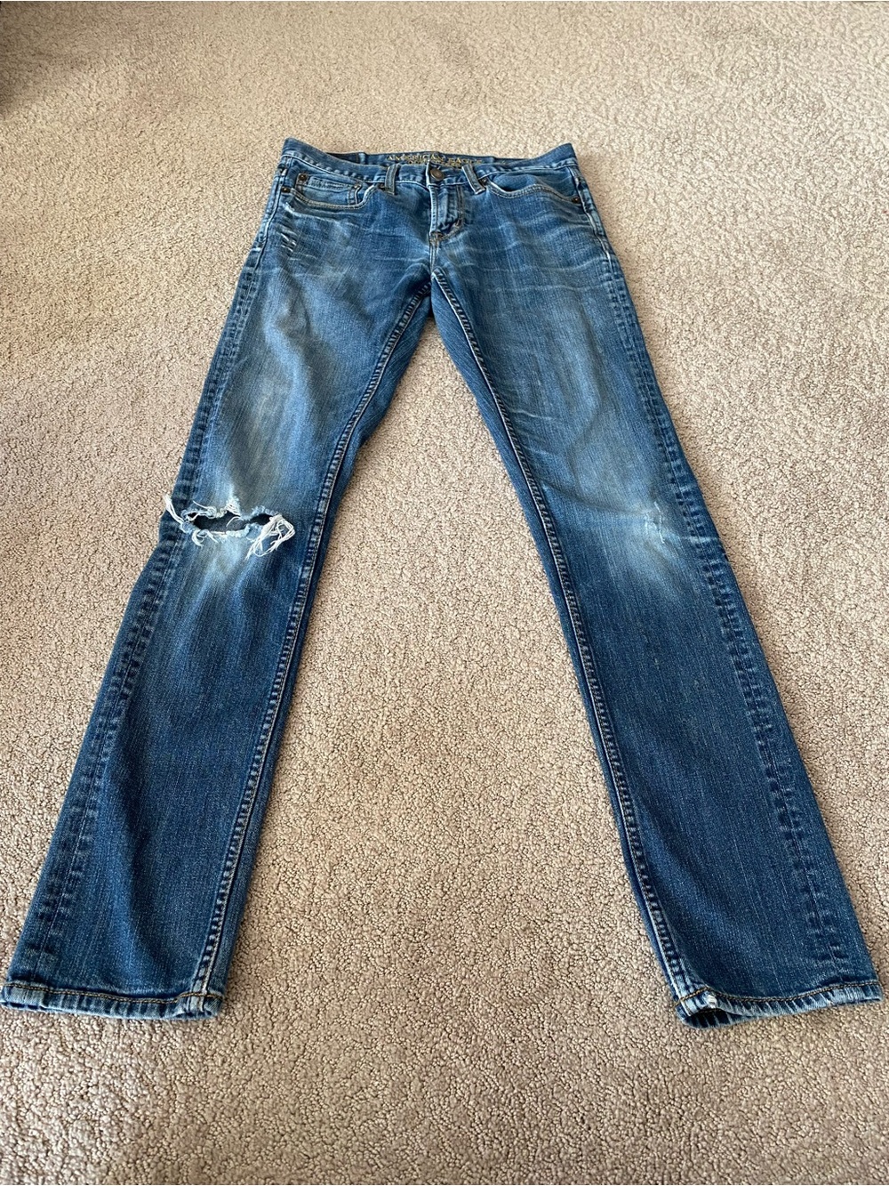American Eagle Outfitters Light Blue Denim Jeans with Gold Stitching